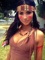Young pretty woman dressed as an Indian.