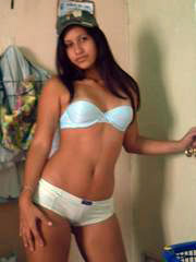 Sexy young latina in blue panties and bra